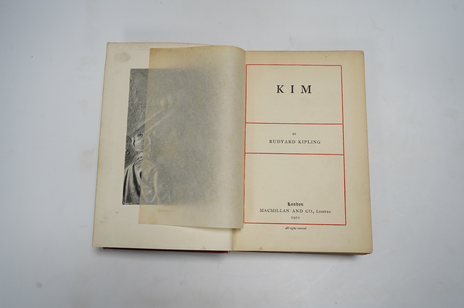 Kipling, Rudyard – Kim, 1st English edition, 8vo, photographic plates, tissue-guard, 2pp. publisher’s advertisement to rear, original red cloth, gilt medallion to upper cover, Macmillan & Co. Ltd., London, 1901. Together